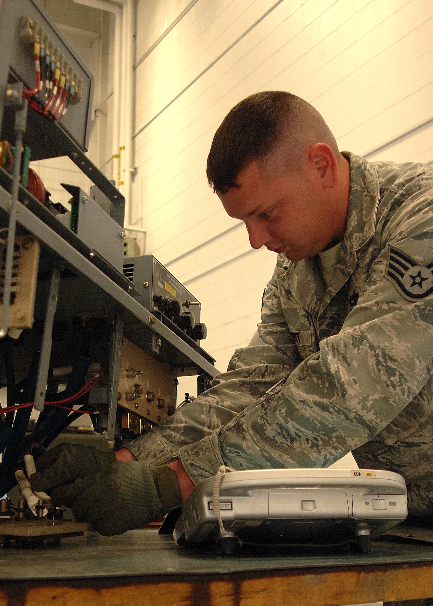 Staff Sgt. William Joubert, 319th Operation Support Squadron, works on a disassembled generator June 11, 2013, on Grand Forks Air Force Base, N.D.  Joubert was named the Warrior of the Week for the second week of June.  (U.S. Air Force Photo/Airman 1st Class Zachiah Roberson)