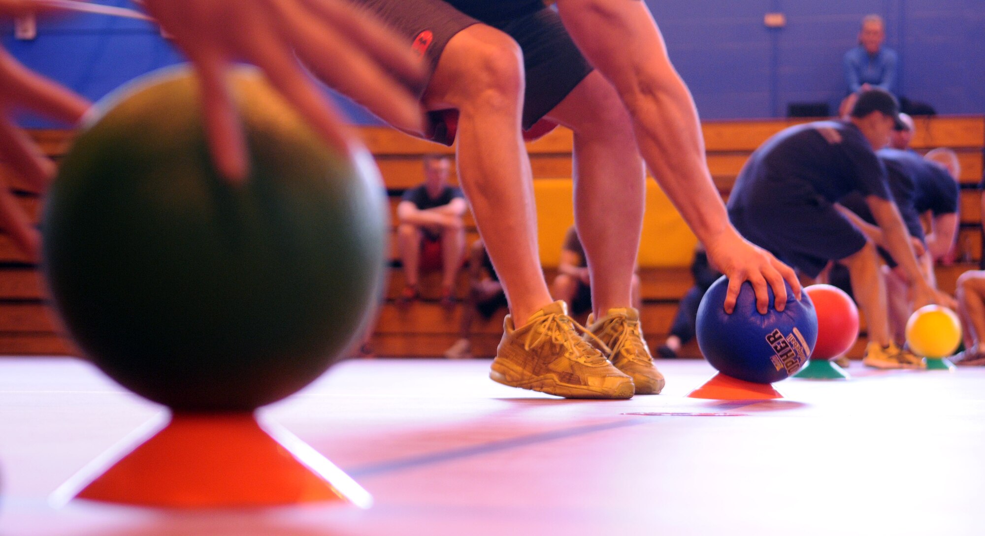 Team Mildenhall Airmen participate in a dodgeball tournament June 13, 2013, at the North Side Fitness Center on RAF Mildenhall, England. The tournament was one of several Marauder Melee squadron sports events.  Other sports events included volleyball, tennis, ping pong, bowling and basketball. (U.S. Air Force photo by Staff Sgt. Tabitha M. Lee/Released)