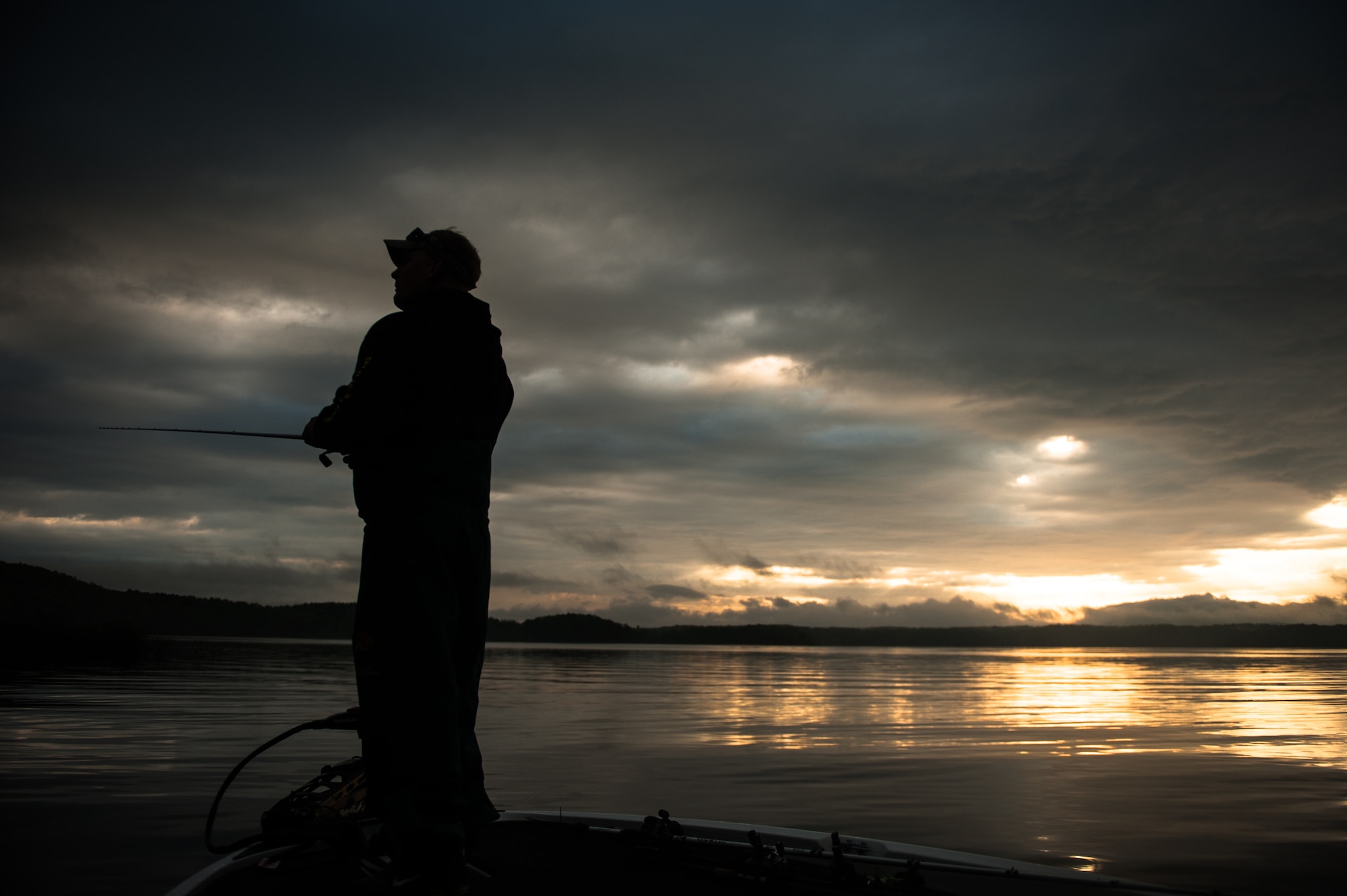 Master Sgt. Jeff Wade makes his first cast of the day April 27, 2013, at Lake Ouachita, Ark. Wade was competing in a fishing tournament on the Toyota Bassmaster Weekend Series, operated by American Bass Anglers.  (U.S. Air Force photo by Staff Sgt. Russ Scalf)