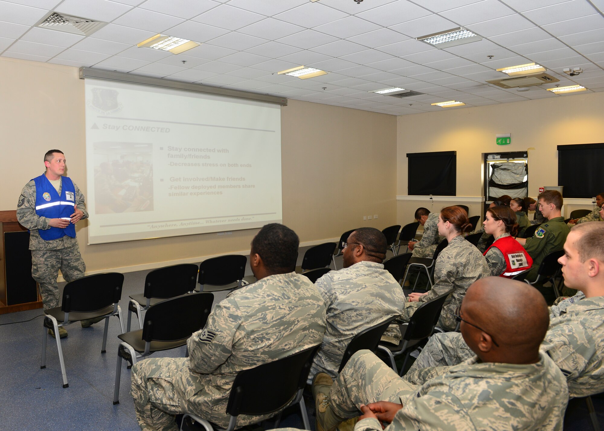 ROYAL AIR FORCE LAKENHEATH, England – Master Sgt. Jack Hartman, 48th Force Support Squadron Airman and Family Readiness Center, gives Liberty Airmen a pre-deployment briefing on AFRC programs during a phase I exercise June 10, 2013. The Airmen were maintaining proficiency at generating sorties for deployment within 96 hours. (U.S. Air Force photo by Staff Sgt. Stephanie Mancha)