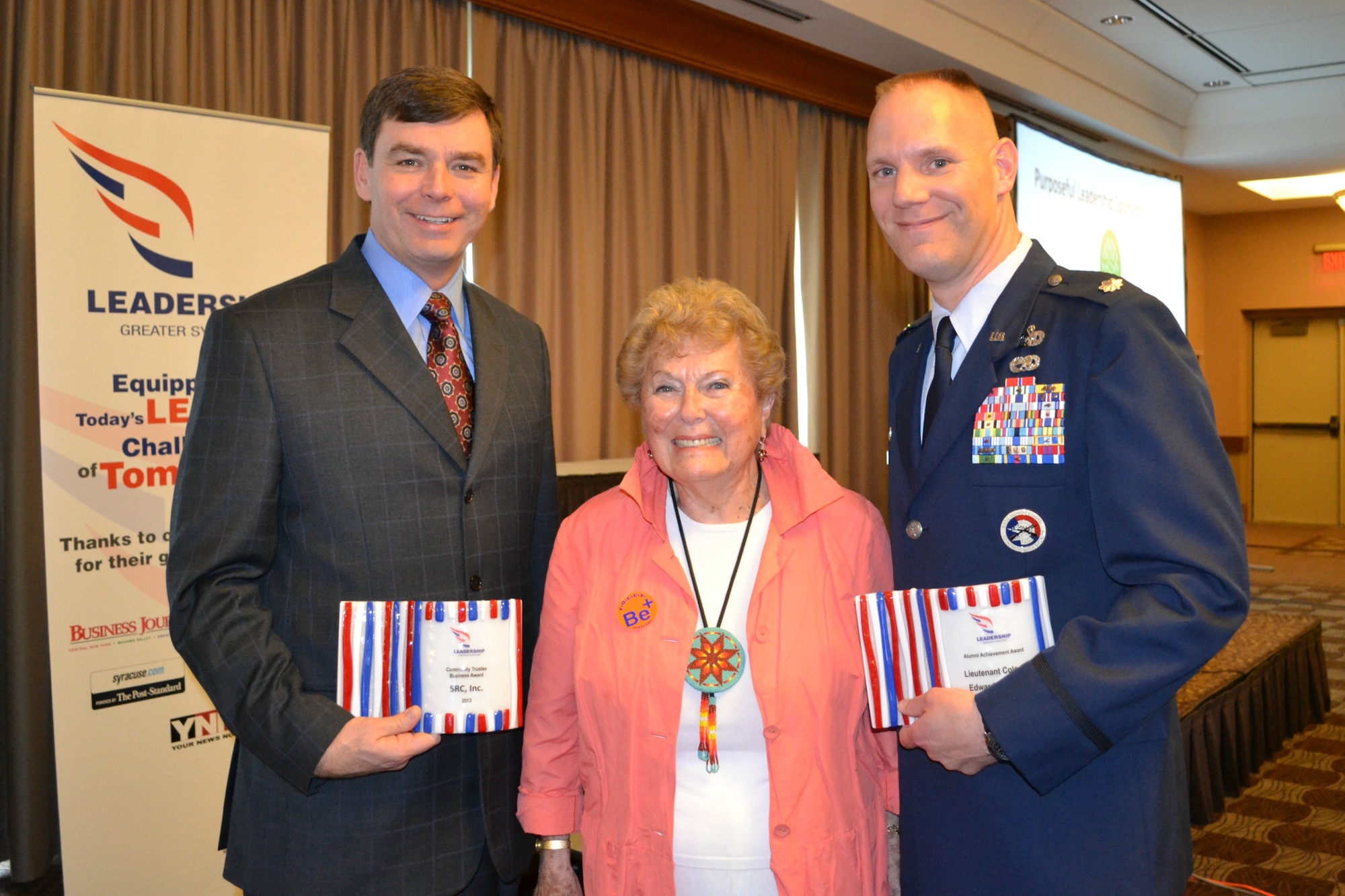 New York Air National Guard Lt. Col. Edward Cook (right) poses with fellow receiptients of the Leadership Greater Syracuse (LGS) Distinguished Community Leader Awards during a ceremony held on on April 25, 2013.  Lt. Col. Cook is the Logistrics Readiness Squadron Commander for the 174th Attack Wing, Hancock Field Air National Guard Base, Syracuse, New York, and was a LGS 2010 graduate.  (photo by New York Air National Guard Lt. Col. Catherine Hutson).