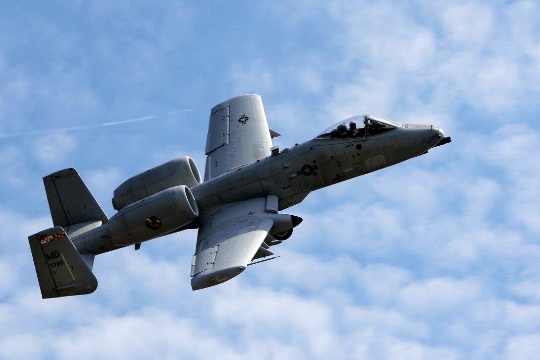 A U.S. Air Force A-10C Thunderbolt II aircraft conducts a show of force in support of ground forces as part of Saber Strike 2013 in Adazi, Latvia, June 7, 2013. The pilot is assigned to the Maryland Air National Guard's 104th Fighter Squadron.