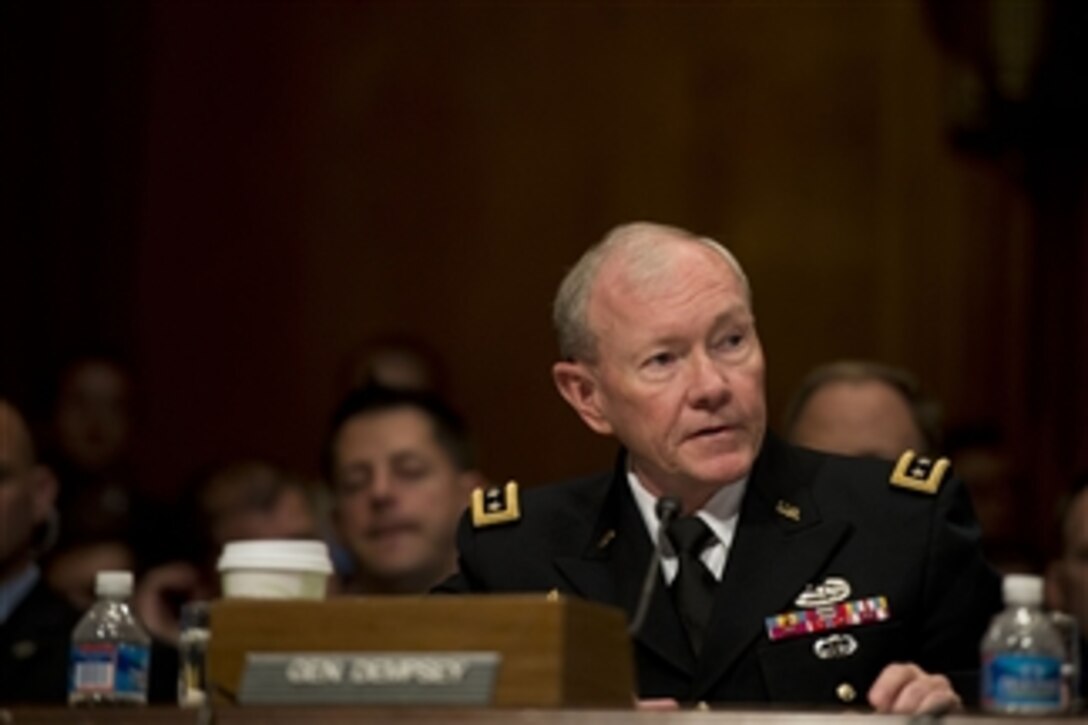 Chairman of the Joint Chiefs of Staff Gen. Martin E. Dempsey testifies before the Senate Budget Committee in the Dirksen Senate Office Building in Washington, D.C., on June 12, 2013.  Dempsey joined Secretary of Defense Chuck Hagel in defending the president’s request for $526.6 billion for the Defense Department’s fiscal year 2014 budget.  