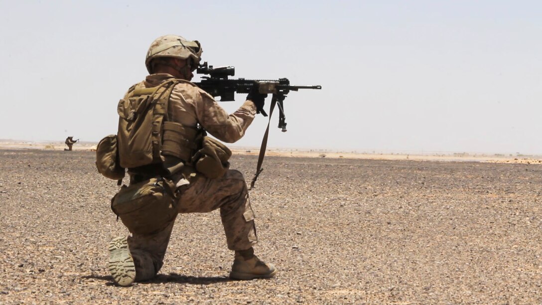 A U.S. Marine assigned to Company L, Battalion Landing Team 3/2, 26th Marine Expeditionary Unit (MEU), provides security during a patrolling exercise in Al Quweira, Jordan, during Exercise Eager Lion 13, June 12, 2013. Exercise Eager Lion 2013 is an annual, multinational exercise designed to strengthen military-to-military relationships and enhance security and stability in the region by responding to modern-day security scenarios. The 26th MEU is a Marine Air-Ground Task Force forward-deployed to the U.S. 5th Fleet area of responsibility aboard the Kearsarge Amphibious Ready Group serving as a sea-based, expeditionary crisis response force capable of conducting amphibious operations across the full range of military operations. (U.S. Marine Corps photo by Lance Cpl. Juanenrique Owings, 26th MEU Combat Camera/Released)