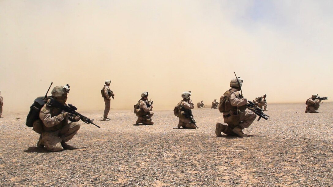 U.S. Marines and U.S. Sailors assigned to Company L, Battalion Landing Team 3/2, 26th Marine Expeditionary Unit (MEU), provide security during a patrolling exercise in Al Quweira, Jordan, during Exercise Eager Lion 13, June 12, 2013. Exercise Eager Lion 2013 is an annual, multinational exercise designed to strengthen military-to-military relationships and enhance security and stability in the region by responding to modern-day security scenarios. The 26th MEU is a Marine Air-Ground Task Force forward-deployed to the U.S. 5th Fleet area of responsibility aboard the Kearsarge Amphibious Ready Group serving as a sea-based, expeditionary crisis response force capable of conducting amphibious operations across the full range of military operations. (U.S. Marine Corps photo by Lance Cpl. Juanenrique Owings, 26th MEU Combat Camera/Released)