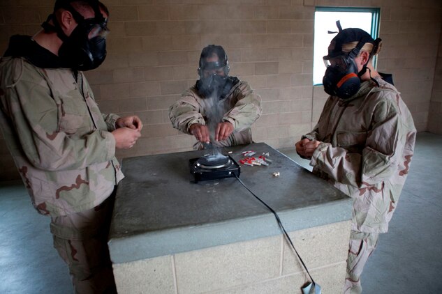 Headquarters Battalion Marines breathe easy during gas chamber training ...