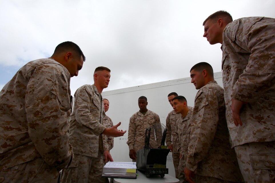 Sgt. Dustin Conrady, a crew supervisor for communications and navigation with Marine Aircraft Logistics Squadron 11 and an Enid, Okla., native, gives a class to his crew aboard Marine Corps Air Station Miramar, Calif., March 8. As some of the most experienced members of the crew, sergeants are seen as subject matter experts in their field and pass their knowledge and experience on to new generations of Marines as often as possible.