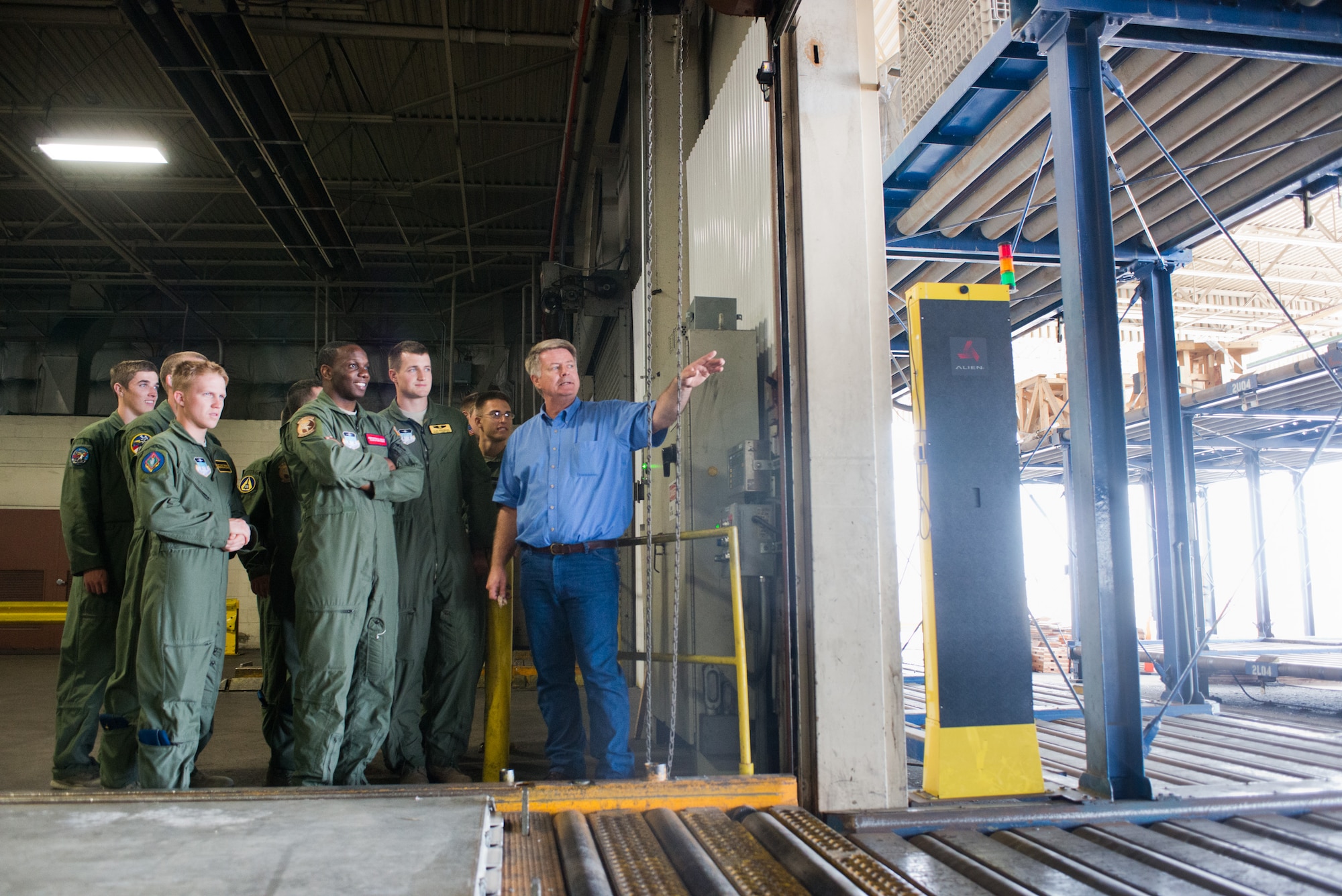 Mr. Rick Salek, 60th Aerial Port Squadron air freight foreman, describes the workflow processes of the APS to a group of Air Force Academy cadets Monday afternoon. The cadets visited Travis as part of Operation Air Force, which is designed to give them a better understanding of how the Air Force completes its varied missions. (Air Force Photo/Ken Wright)