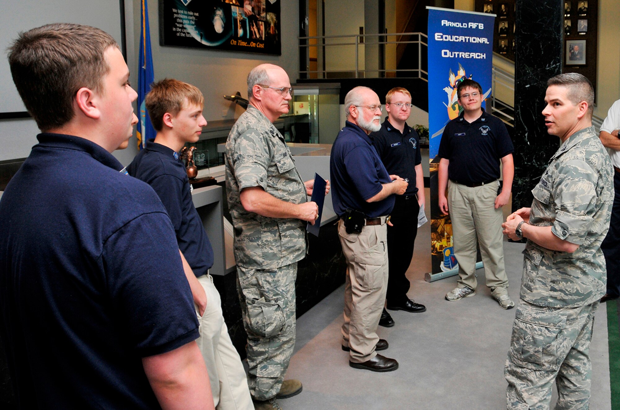 AEDC Commander Col. Raymond Toth (right) congratulates the Coffee County Central High School (CCCHS) AFJROTC CyberPatriot team on their recognition from the Air Force Association for finishing first in the state. Pictured here left to right is Dalton Camron, Samuel West, CCCHS AFJROTC Senior Aerospace Science Instructor Lt. Col. Phillip Bailey, Gen. H.H. Arnold AFA Chapter President Claude Morse, Steven Messick and Clayton Whitt. (Photo by Rick Goodfriend)