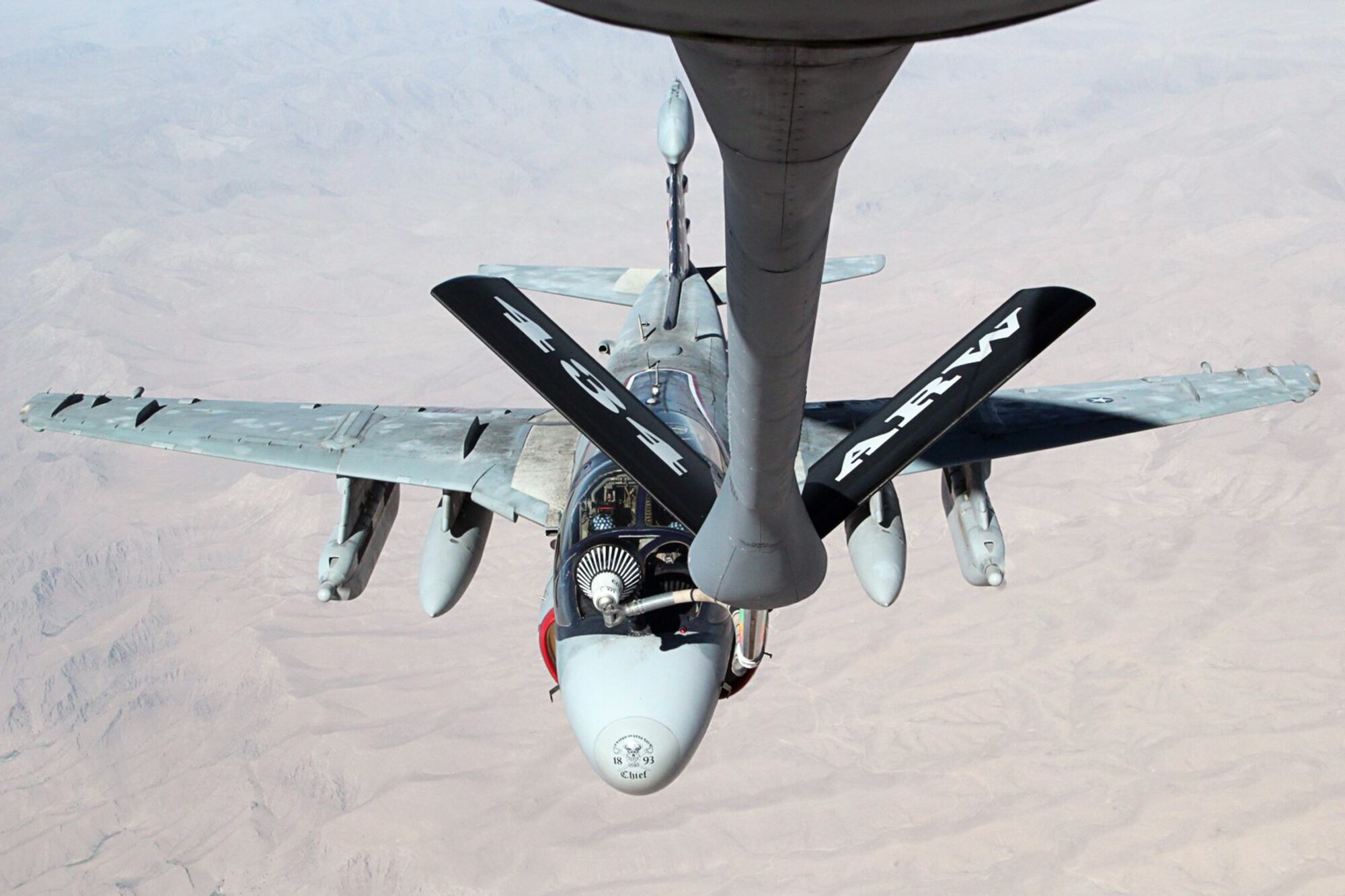 A 434th Air Refueling Wing KC-135R Stratotanker from Grissom Air Reserve Base, Ind., refuels a U.S. Navy EA-6B Prowler assigned to the Patriots of Electronic Attack Squadron (VAQ) 140, embarked aboard the aircraft carrier USS Dwight D. Eisenhower (CVN 69), during a mission over Southwest Asia. Aircrew and aircraft from the 434th ARW were deployed to the region in support of Operation Enduring Freedom. The USS Dwight D. Eisenhower is deployed to the U.S. 5th Fleet area of responsibility, promoting maritime security operations, theater security cooperation efforts and support missions as part of OEF. (U.S. Air Force photo/Staff Sgt. Courtney Storey)
