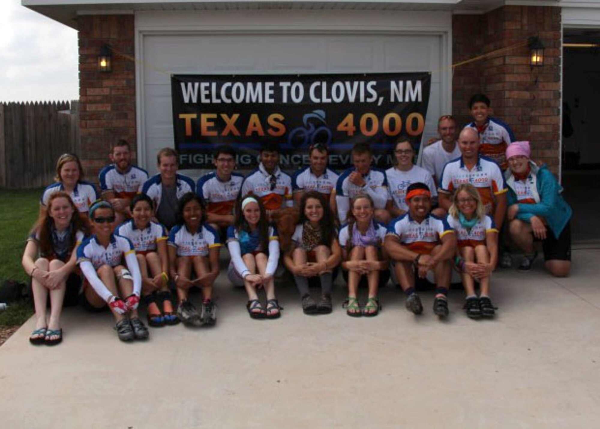 Members of the 10th Annual Texas 4000 team pose for a group photo after enjoying a home-cooked meal courtesy of Capt. Jason Ward, 16th Special Operations Squadron, and his wife, Amy in Clovis, N.M., June 6, 2013. Dedicated to fighting cancer by sharing hope, knowledge and charity, the group of amateur cyclists will ride more than 4,500 miles from Austin, Texas to Anchorage, Alaska over the course of 70 days. (Courtesy photo)
