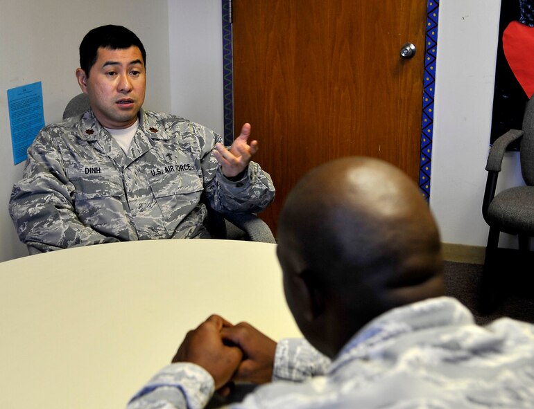 Maj. Van Dinh, 2nd Bomb Wing deputy chaplain provides counseling to an Airman on Barksdale Air Force Base, June 11, 2013. Chaplain counseling duties complement the Airman & Family Readiness Center’s programs to help Airmen, regardless of their issues. (U.S. Air Force photo/Airman 1st Class Benjamin Raughton)