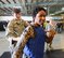 Ms. S. Renee Smith, Honorary Commander for the 436th Aircraft Maintenance Squadron, (wearing jeans) wields a simulated ASP baton while sparring with a 436th Security Forces Squadron member wearing a protective red suit to experience some of the training Raven's go through during an in-depth tour of Dover Air Force Base, Delaware's 436th Security Forces Squadron, June 5, 2013.Raven's are highly trained Security Forces personnel who deploy with military aircraft and provide on-site security for the aircraft around the world.  (U.S. Air Force photo/Greg L. Davis)