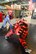 Ms. S. Renee Smith, Honorary Commander for the 436th Aircraft Maintenance Squadron, (wearing jeans) wields a simulated ASP baton while sparring with a 436th Security Forces Squadron member wearing a protective red suit to experience some of the training Raven's go through during an in-depth tour of Dover Air Force Base, Delaware's 436th Security Forces Squadron, June 5, 2013.Raven's are highly trained Security Forces personnel who deploy with military aircraft and provide on-site security for the aircraft around the world.  (U.S. Air Force photo/Greg L. Davis)