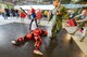 Ms. S. Renee Smith, Honorary Commander for the 436th Aircraft Maintenance Squadron, (wearing jeans) wields a simulated ASP baton while sparring with a 436th Security Forces Squadron member wearing a protective red suit to experience some of the training Raven's go through during an in-depth tour of Dover Air Force Base, Delaware's 436th Security Forces Squadron, June 5, 2013.Raven's are highly trained Security Forces personnel who deploy with military aircraft and provide on-site security for the aircraft around the world.  (U.S. Air Force photo/Greg L. Davis)