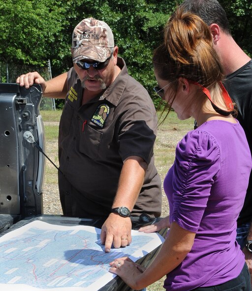 Paul Williamson, 2nd Force Support Squadron Outdoor Recreation manager, maps out the course for the upcoming alphARace on Barksdale Air Force Base, La., June 4, 2013.  The race is designed to bring the Airmen of Barksdale together with local community members for healthy competition. (U.S. Air Force photo/2nd Lt. Chris Sullivan)