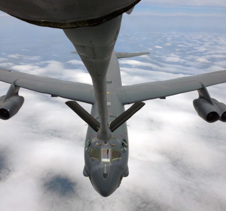 A B-52 Stratofortress from the 5th Bomb Wing, Minot Air Force Base, N.D., receives fuel from a KC-135 Stratotanker assigned to McConnell Air Force Base, Kan., during an air refueling training mission, June 14, 2013.  The KC-135 aircrew was made up of Air Force Reservists from the 18th Air Refueling Squadron, 931st Air Refueling Group at McConnell.  (U.S. Air Force photo by Senior Master Sgt. Ray Lewis)
