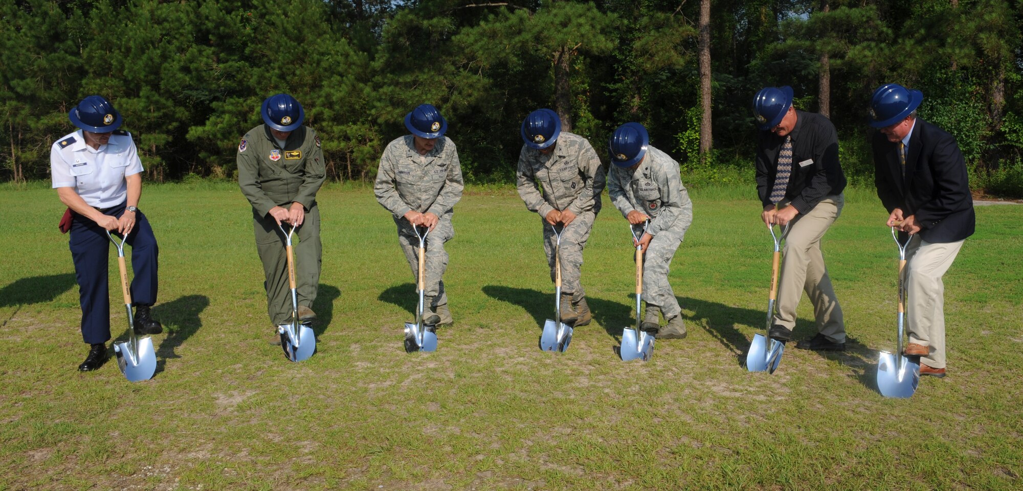 Wing leadership and contractors break ground for the HC-130J Combat King II Simulator Facility at Moody Air Force Base, Ga., June 13, 2013. The cost of the building will be $7.7 million and is estimated to be completed November 2014. (U.S. Air Force photo by Airman Alexis Grotz/Released)
