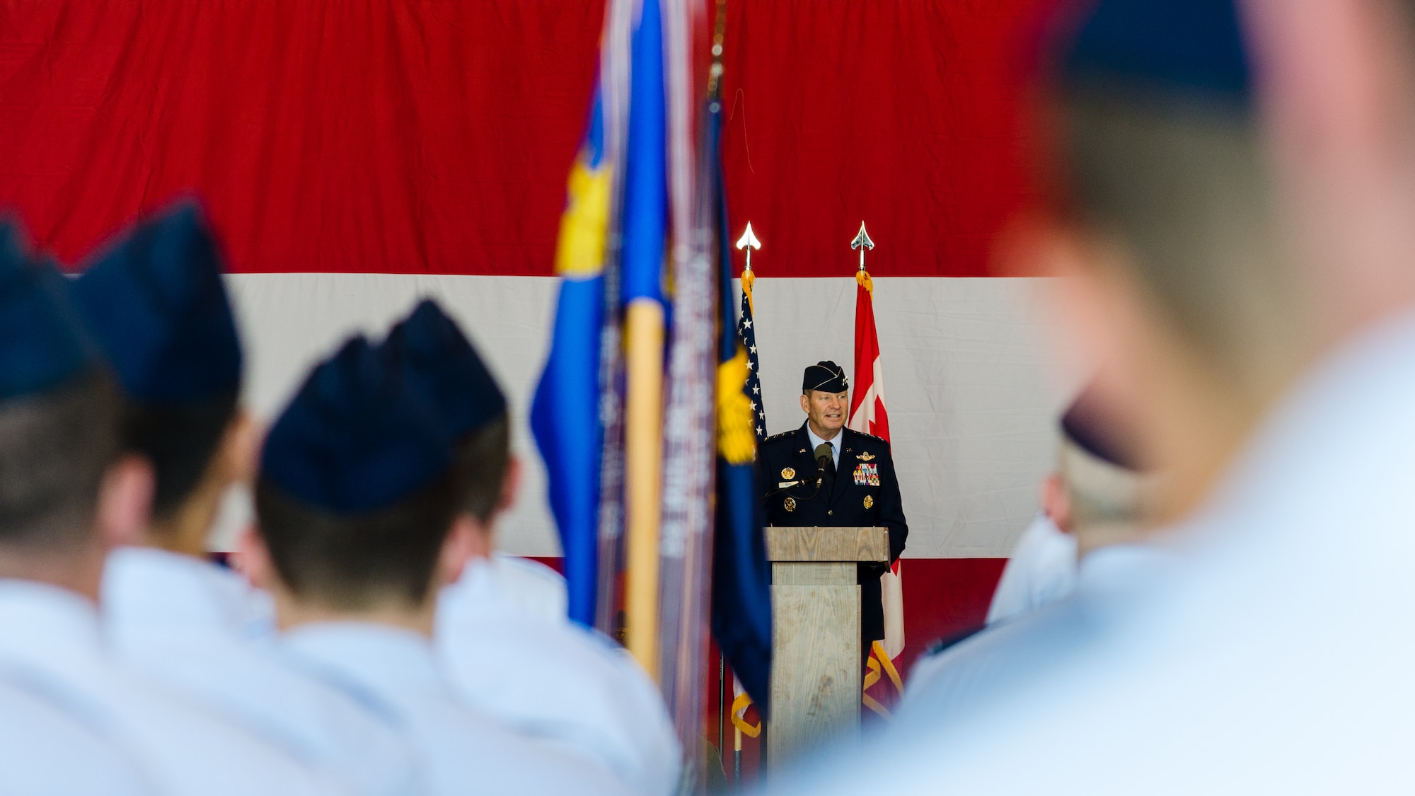 The men and women of the 552nd Air Control Wing listen to Lt. Gen. Robin Rand, 12th Air Force (Air Forces Southern) commander speak about the accomplishments of the wing at the 552 ACW change of command ceremony. Col. Jay Bickley assumed command of the 552nd ACW, June 13 during the ceremony. (U.S. Air Force Photo/Senior Airman Kristopher Gooden)