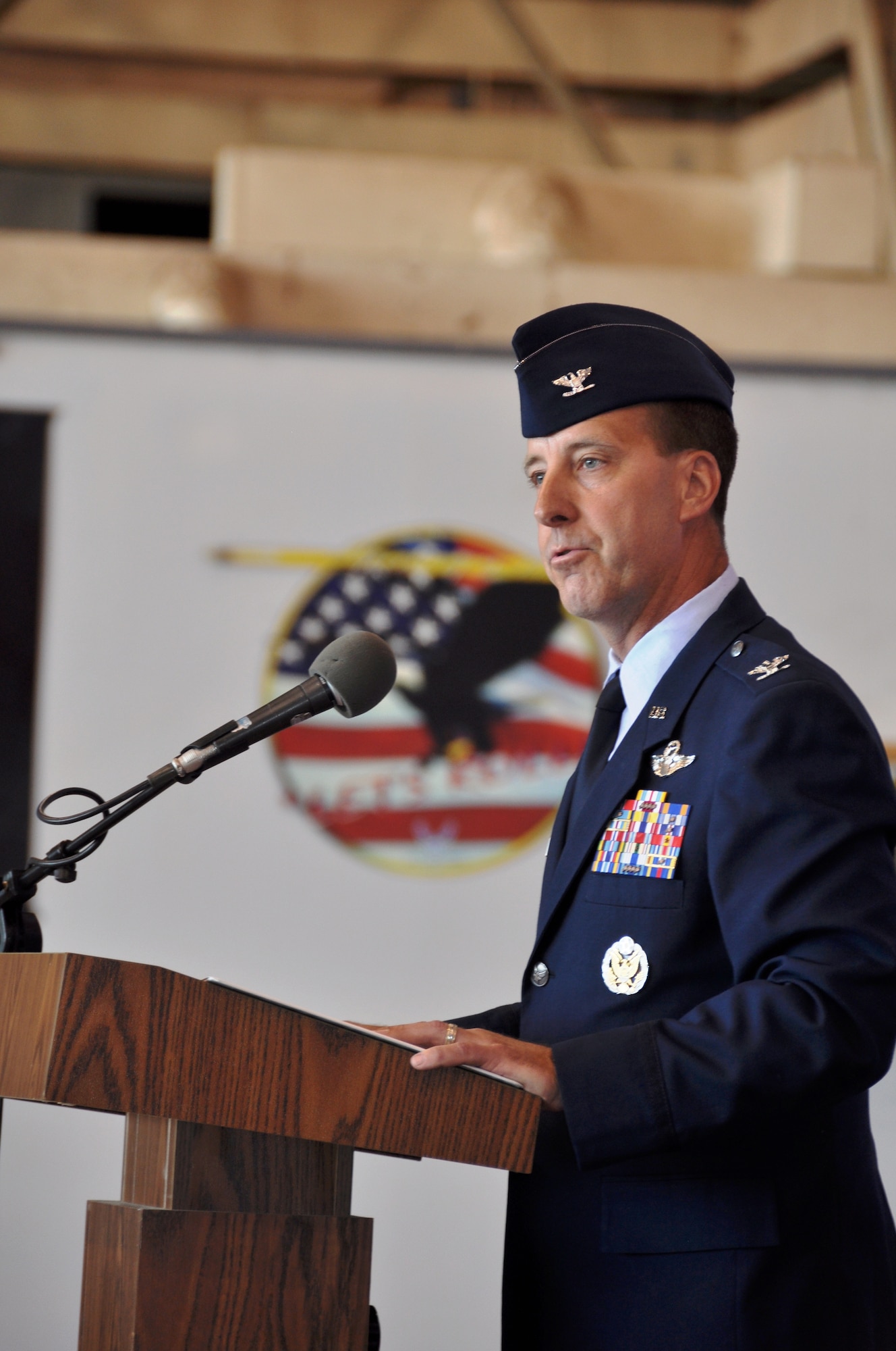 Colonel Jay Bickley, 552nd Air Control Wing commander, speaks to the men and women of the wing after taking command at a ceremony here, June 13.  Col. Bickley now leads more than 5,000 men and women, providing worldwide command and control, operating the E-3 Airborne Warning and Control System and ground based Control and Reporting Centers. (U.S. Air Force Photo/Maj. Jon Quinlan)  
