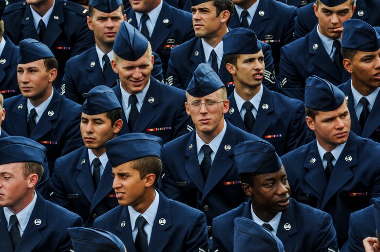 Airmen attending tactical air control-party technical training school get a short break while waiting for a ceremony to begin June 6, 2013 on Hurlburt Field, Fla. TAC-P members must complete at least 19 weeks of training before entering special operations forces. (U.S. Air Force photo/Airman 1st Class Christopher Callaway) 