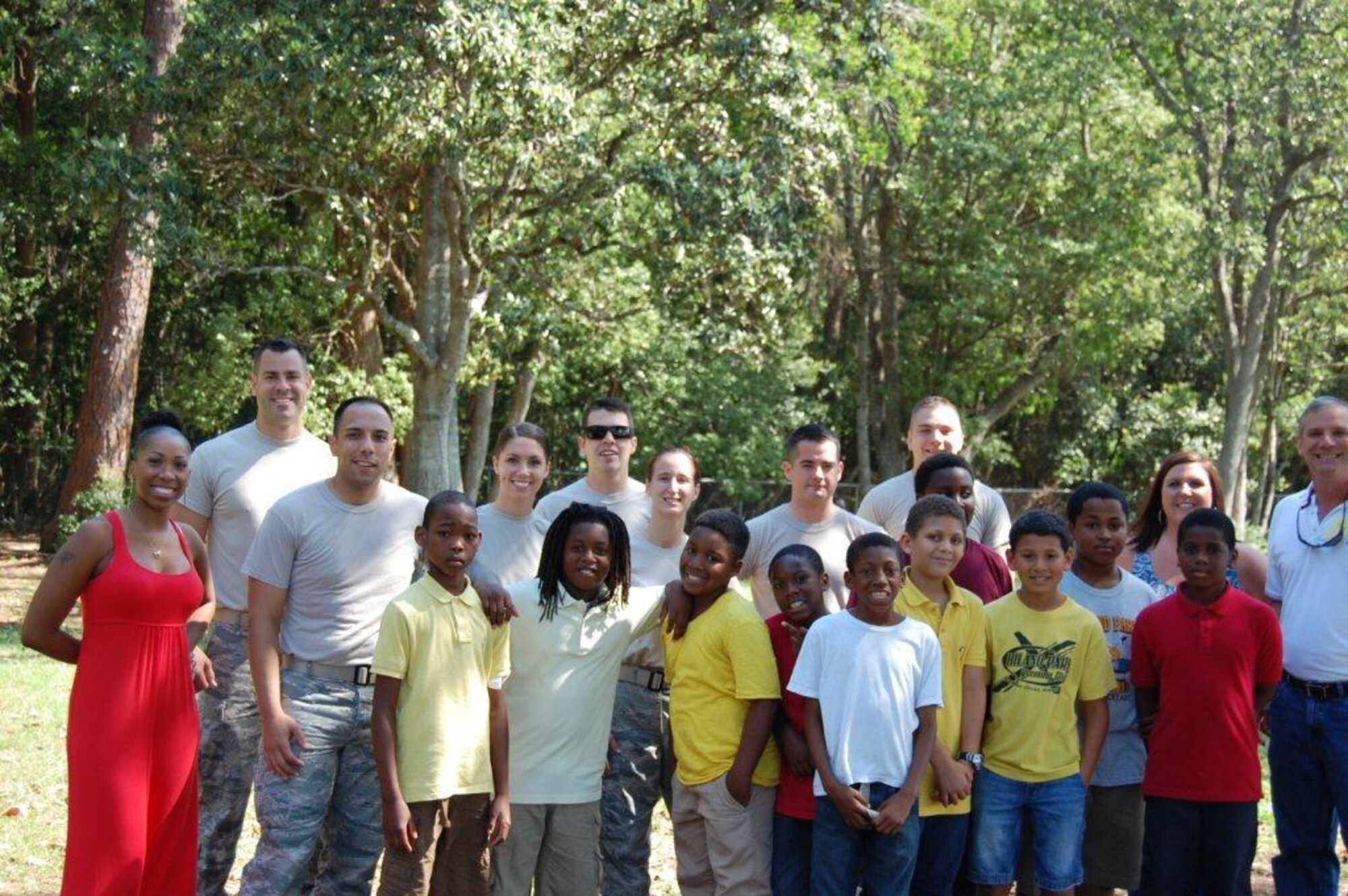 Fifteen members of the 325th Contracting Squadron spent the last several months mentoring students Hiland Park Elementary as part of the school’s improvement plan. 
The group mentored fourth and fifth grade students for the last half of the school year. Activities ranged from math jeopardy to outdoor games. (Courtesy Photo) 
