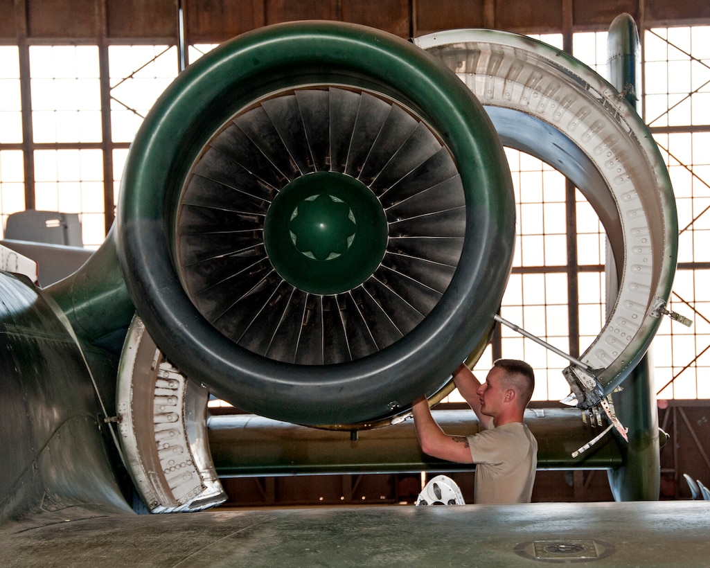 U.S. Air Force Airman 1st Class Jerry Lyons of the 362nd Training Squadron, A-10 Crew Chief Course, removes and installs engine door cowls and shrouds on an A-10 aircraft on June 12, 2013, Sheppard Air Force Base, Texas (US Air Force photo by Frank Carter)