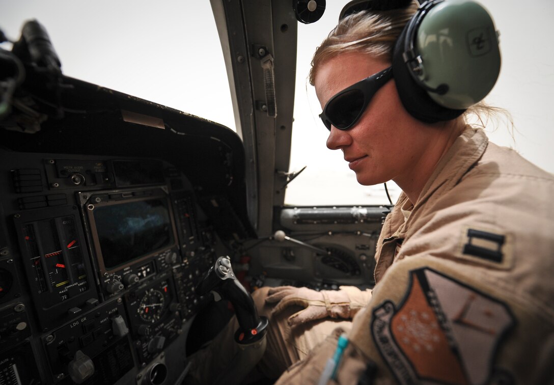 Capt. Nikki Jansen performs pre-flight checks of a B-1B Lancer June 11, 2013, at the 379th Air Expeditionary Wing in Southwest Asia. Jansen is a 34th Expeditionary Bomb Squadron pilot deployed from Ellsworth Air Force Base, S.D. (U.S. Air Force photo/Senior Airman Benjamin Stratton)