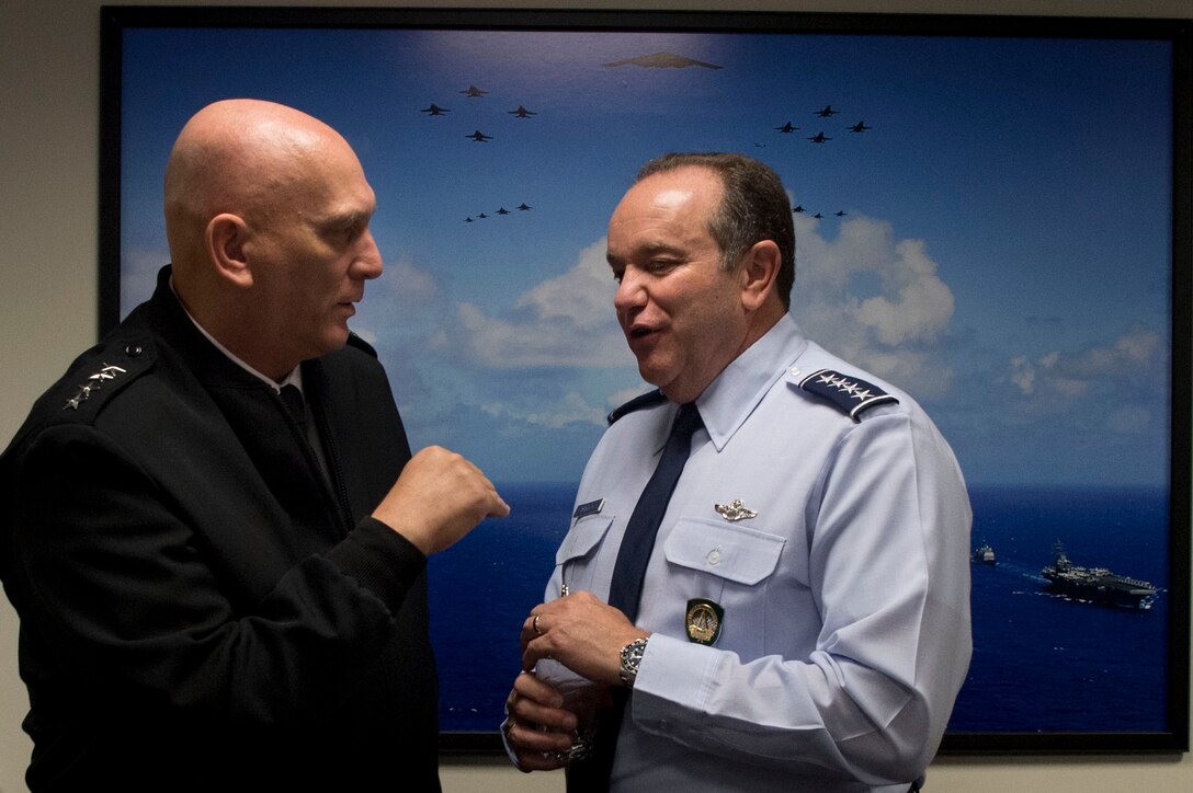 Army Chief of Staff Gen. Ray Odierno, left, speaks with Air Force Gen. Philip M. Breedlove, commander of U.S. European Command and supreme allied commander for Europe, during a Senior Leadership Meeting at the Pentagon, June 14, 2013. 
