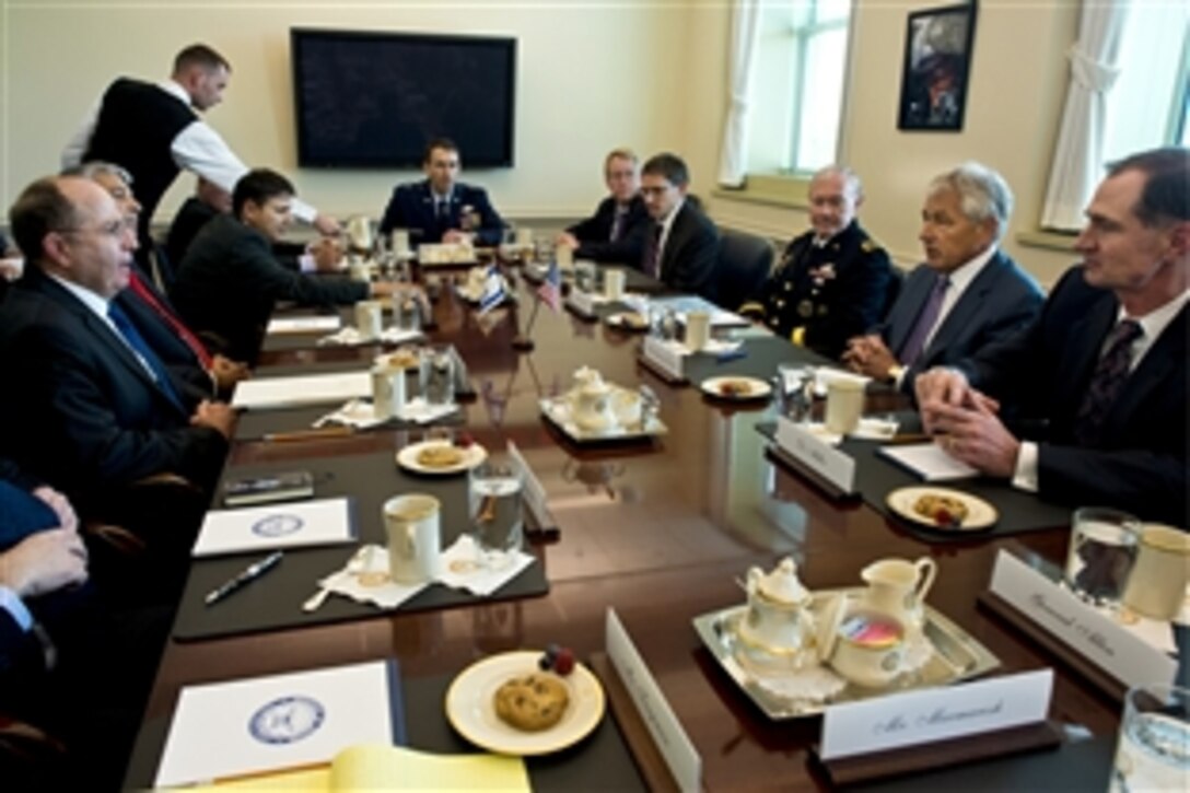 U.S. Defense Secretary Chuck Hagel meets with Israeli Defense Minister Moshe Yaalon at the Pentagon, June 14, 2013.