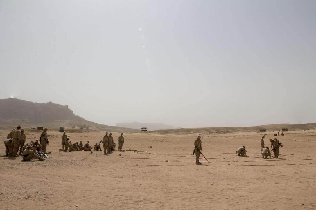 U.S. Marines assigned to Battalion Landing Team 3/2, 26th Marine Expeditionary Unit (MEU), conduct improvised explosive device lane training in Al Humaymah, Jordan, June 9, 2013. Exercise Eager Lion 2013 is an annual multinational exercise designed to strengthen military-to-military relationships and enhance security and stability in the region by responding to modern-day security scenarios. The 26th MEU is a Marine Air-Ground Task Force forward-deployed to the U.S. 5th Fleet area of responsibility aboard the Kearsarge Amphibious Ready Group serving as a sea-based, expeditionary crisis response force capable of conducting amphibious operations across the full range of military operations. (U.S. Marine Corps photo by Cpl. Kyle N. Runnels/Released)