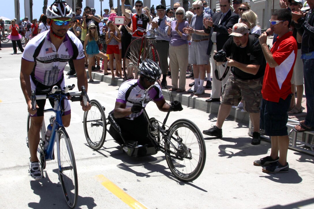 Keola Dietz and Anthony Robinson crossed the Race Across America starting line at Oceanside Pier in Oceanside, Calif. June 15. Dietz and Robinson are both veterans and wounded warriors racing for the Walter Reed Bethesda Cycling team, which is made up of wounded Army and Marine Corps veterans who will compete in the 3,000-mile race from Oceanside, Calif. to Annapolis, Md. 