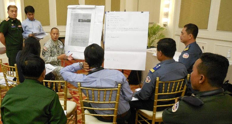 Lt. Col.  Evan Ting, who is the Deputy Division Engineer for South/Southeast Asia at the U.S. Army Corps of Engineers-Pacific Ocean Division, facilitates a work group during the 2013 Lower Mekong Initiative Disaster Response Exercise & Exchange in Phnom Penh, Cambodia.