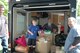 From left to right: Derrick Ellis, son of Ken Ellis, a civilian with the 2d Systems Operations Squadron, Samuel Tristan, son of Senior Master Sgt. Angela Tristan, 2d SYOS, Lou Pell and Ken Ellis, 2d SYOS civilians, load items donated by the members of the Air Force Weather Agency and others to support tornado victims of the Absentee Shawnee Tribe Resource Center in Norman, Okla. The team took nearly 2,000 pounds of donated supplies to Oklahoma to include water, food, clothes, toiletries and even dog food. (Courtesy photo)