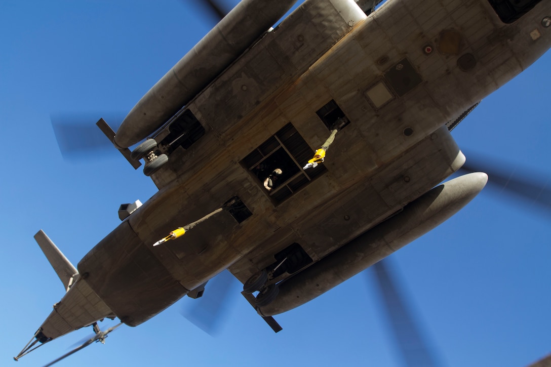 A CH-53E Super Stallion assigned to Marine Medium Tiltrotor Squadron (VMM) 266 (Reinforced), 26th Marine Expeditionary Unit (MEU), descends during Exercise Eager Lion 2013 in Al Quweira, Jordan, June 13, 2013. Exercise Eager Lion 2013 is an annual multinational exercise designed to strengthen military-to-military relationships and enhance security and stability in the region. The 26th MEU is a Marine Air-Ground Task Force forward-deployed to the U.S. 5th Fleet area of responsibility aboard the Kearsarge Amphibious Ready Group serving as a sea-based, expeditionary crisis response force capable of conducting amphibious operations across the full range of military operations. (U.S. Marine Corps photo by Cpl. Kyle N. Runnels/Released)