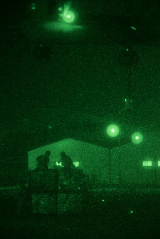 A helicopter suspension team assigned to landing support detachment, Combat Logistics Battalion 26, 26th Marine Expeditionary Unit (MEU), prepares to attach a quadcon to a CH-53E Super Stallion assigned to Marine Medium Tiltrotor Squadron (VMM) 266 (Reinforced), 26th MEU, during Exercise Eager Lion 2013 in Al Quweira, Jordan, June 13, 2013. Exercise Eager Lion 2013 is an annual multinational exercise designed to strengthen military-to-military relationships and enhance security and stability in the region. The 26th MEU is a Marine Air-Ground Task Force forward-deployed to the U.S. 5th Fleet area of responsibility aboard the Kearsarge Amphibious Ready Group serving as a sea-based, expeditionary crisis response force capable of conducting amphibious operations across the full range of military operations. (U.S. Marine Corps photo by Cpl. Kyle N. Runnels/Released)