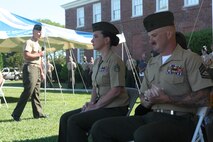 Chief Warrant Officer 3 Lawrence Jeffrey, the presiding officer and long time family friend, gives a speech to Gunnery Sgt. and Staff Sgt. Clements including family and friends during a retirement ceremony aboard Camp Lejeune, N.C., June 14, 2013. Staff Sgt. Clements, along with her husband Gunnery Sgt. Ryan P. Clements, retired from the Marine Corps together. 