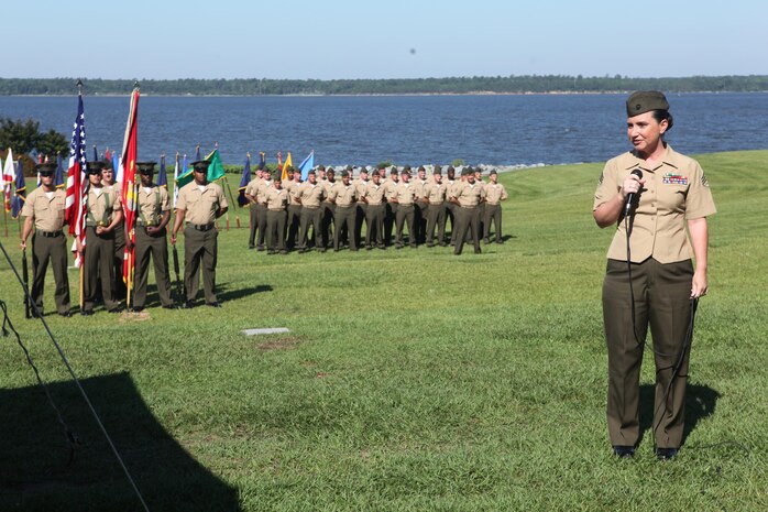 Staff Sgt. Robin R. Clements gives a speech to friends, family and fellow Marines and sailors during her retirement ceremony aboard Camp Lejeune, N.C., June 14, 2013. Staff Sgt. Clements, along with her husband Gunnery Sgt. Ryan P. Clements, retired from the Marine Corps together. 