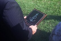 Rowdy C. Griffin, the technical director for Naval Supply Systems Command, reads the American Petroleum Institute Award for excellence in fuel management aboard Camp Lejeune, N.C., June 13, 2013. Bulk Fuel Company, 8th Engineer Support Battalion, 2nd Marine Logistics Group was named the runner-up after competing against tactical bulk fuel companies throughout the entire Marine Corps. 