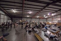Military personnel prepare a medical patient for evacuation Wednesday, Sept. 10, 2008 from Corpus Christi, Texas to a medical facility in Dallas as Hurricane Ike approaches the Texas Gulf Coast. U.S. Northern Command is supporting federal, state and local Hurricane Ike response efforts in Texas, and aeromedical evacuation capabilities remain on alert pending FEMA requests for assistance.