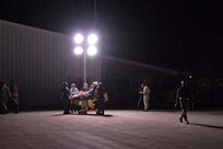 Military personnel take a medical patient to an Air Force C-130 cargo aircraft for evacuation Wednesday, Sept. 10, 2008 from Corpus Christi, Texas to a medical facility in Dallas as Hurricane Ike approaches the Texas Gulf Coast. U.S. Northern Command is supporting federal, state and local Hurricane Ike response efforts in Texas, and aeromedical evacuation capabilities remain on alert pending FEMA requests for assistance.