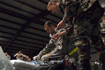 Military personnel prepare a medical patient for evacuation Wednesday, Sept. 10, 2008 from Corpus Christi, Texas to a medical facility in Dallas as Hurricane Ike approaches the Texas Gulf Coast. U.S. Northern Command is supporting federal, state and local Hurricane Ike response efforts in Texas, and aeromedical evacuation capabilities remain on alert pending FEMA requests for assistance.