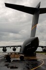 A crew based out of Altus Air Force Base, Oklahoma, prepares to load HUMVEEs, medical supplies and members of 6th Medical Group from MacDill AFB onto a C-17 Globemaster. The supplies are headed to Beaumont, Texas in preparation for hurricane Gustav relief efforts.