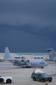 A Navy C-130 sits at the New Orleans International Airport waiting to help evacuate local residents to safety, August 31. Evacuation efforts against Hurricane Gustav were supported by all branches of the military Saturday through Sunday. The evacuees were sent to different cities in neighboring states where relief teams were awaiting their arrival with food, water and shelter. 