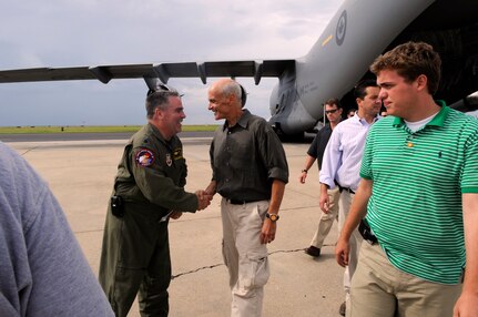 Secretary of Homeland Security Michael Chertoff greets U.S. Air Force Lt. Col. Steve Flanagan during a tour of medical evacuation operations for Hurricane Gustav, Lake Front Airport, New Orleans, LA, Aug. 31, 2008. The Federal Emergency Management Agency and The Department of Defense chartered flights to transport citizens to destinations safely outside the hurricanes path. 