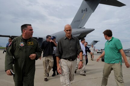Secretary of Homeland Security Michael Chertoff walks with U.S. Air Force Lt. Col. Steve Flanagan during a tour of medical evacuation operations for Hurricane Gustav, Lake Front Airport, New Orleans, La.,, Aug. 31, 2008. The Federal Emergency Management Agency and The Department of Defense chartered flights to transport citizens to destinations safely outside the hurricanes path.