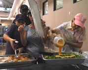 Local volunteers provide hot meals for U.S. military personnel during the Hurricane Gustav relief efforts here, Sept. 2, 2008. 