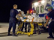 Air Force personnel assigned to the 6th Medical Group out of McDill Air Force Base, Tampa, Fla. and volunteers from the Disaster Medical Assistance Team assist in the evacuation of patients Wednesday, Sept. 10, 2008 from local hospitals and nursing homes as Hurricane Ike approaches the Texas Gulf Coast.