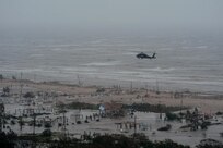 A UH-60 Black Hawk helicopter conducts search and rescue operations in Galveston, Texas, Sept. 13, 2008, following the landfall of Hurricane Ike. 