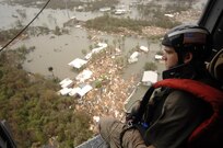 U.S. Air Force Senior Airman Brandon Smith, a pararescueman assigned to the 331st Air Expeditionary Group, conducts search and rescue operations for residents in Galveston, Texas, Sept. 13, 2008, following the landfall of Hurricane Ike. 
